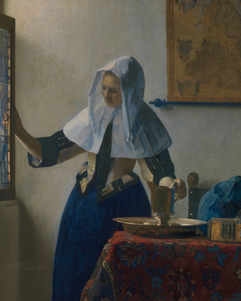 Young Woman with a Water Pitcher by Johannes Vermeer